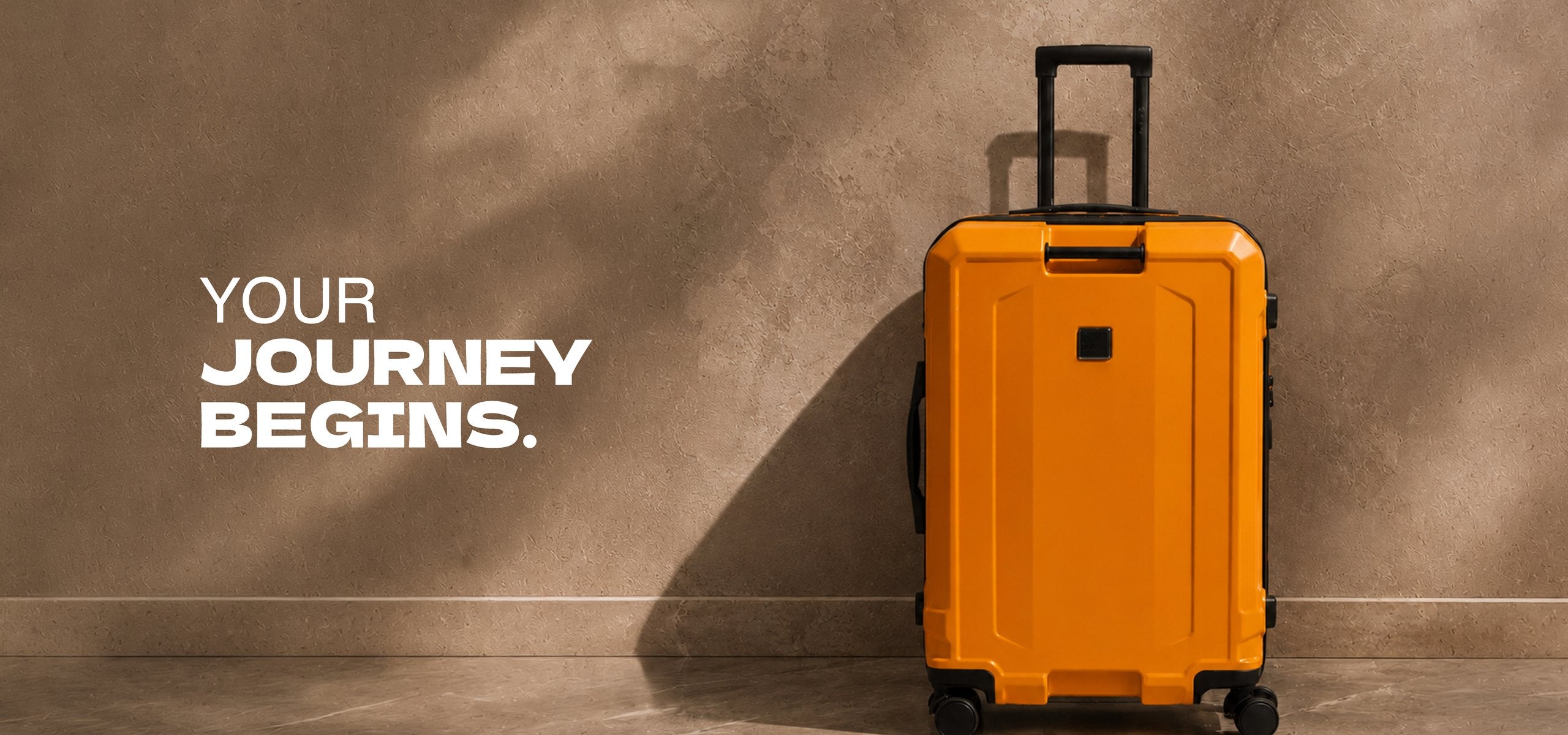 Orange Melon trolley case in a sunlit doorway. Your journey begins.