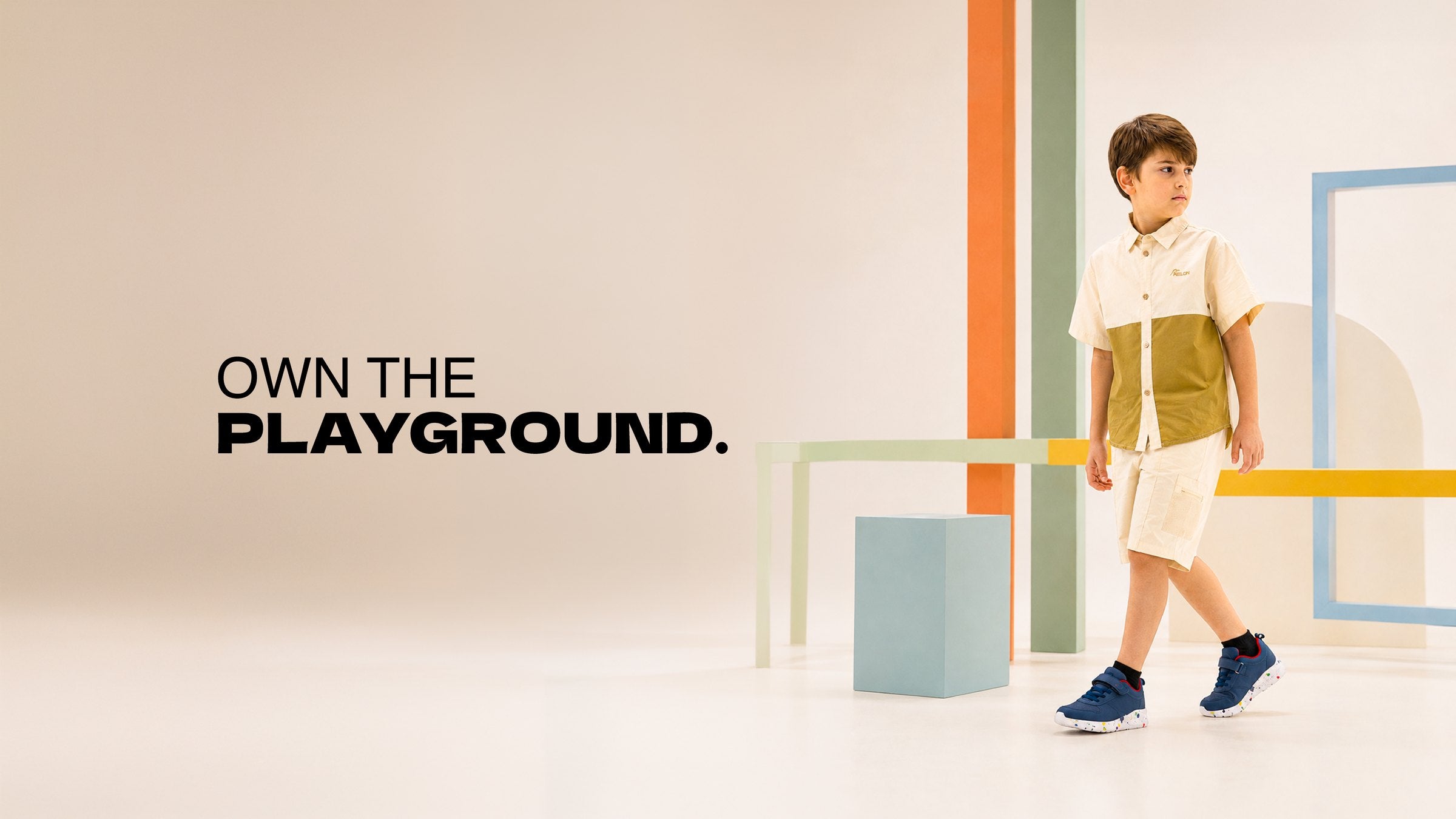 Boy in a Melon shirt and shorts. Own the playground.